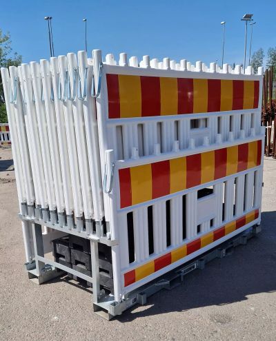 40 meters of white construction site fencing with combi scaffolding and pedestals