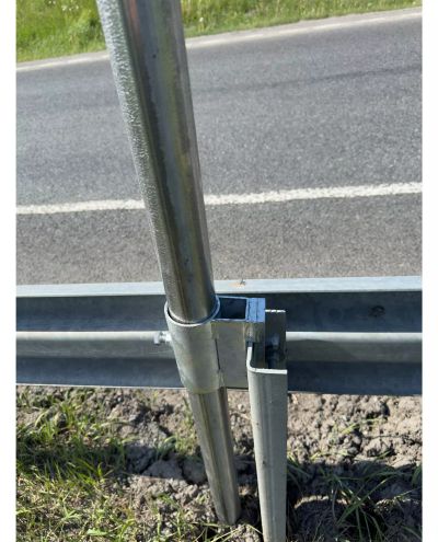 Handrail bracket for highway guardrail posts